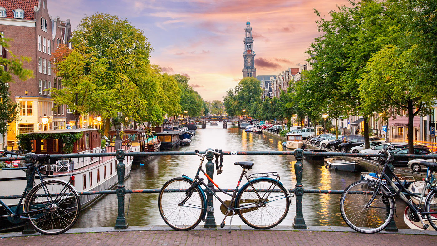 Amsterdam bikes locked up on bridge over canel